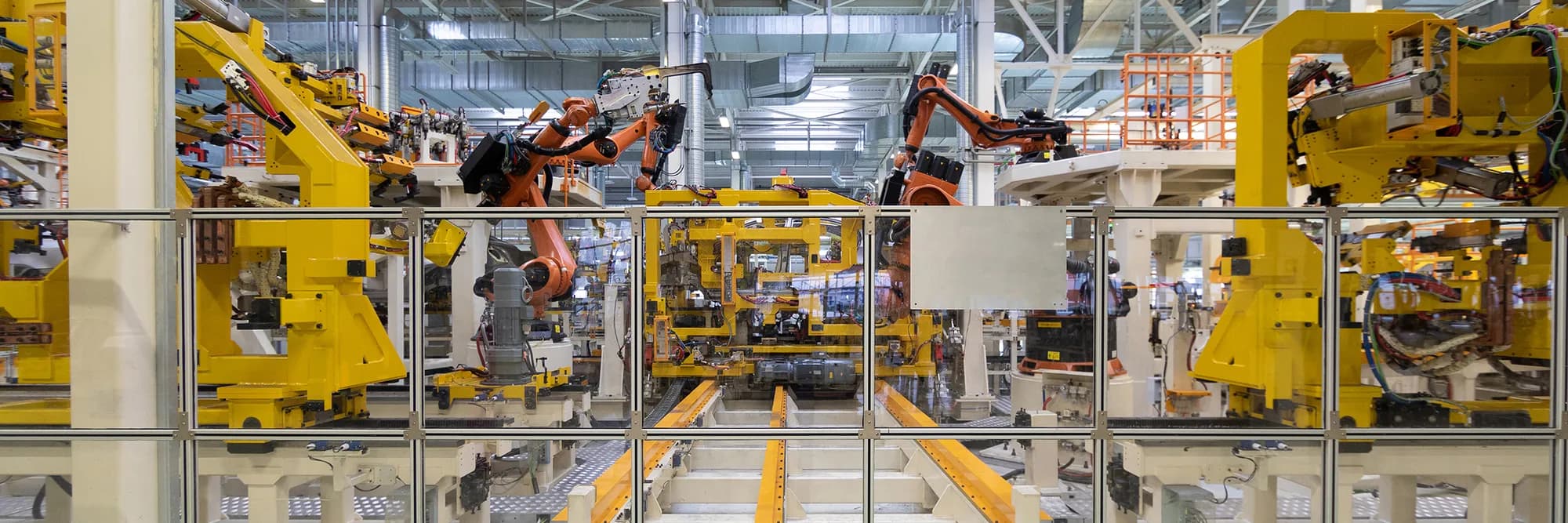 Robot arms on a car body production line