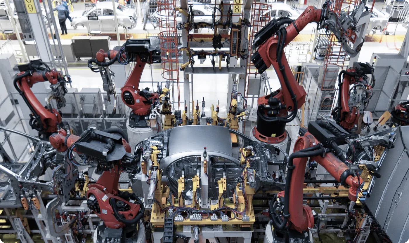 Industrial robots welding on a production line